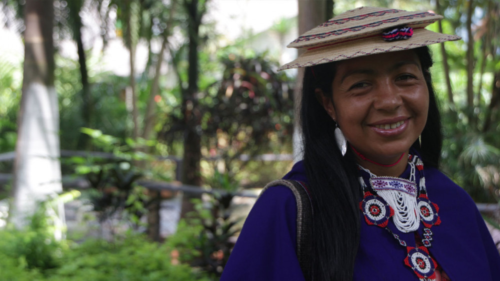 Colombian woman smiles at the camera