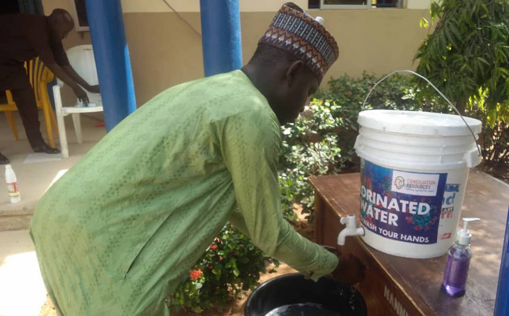 Man washing hands in Nigeria Man washing hands in Nigeria
